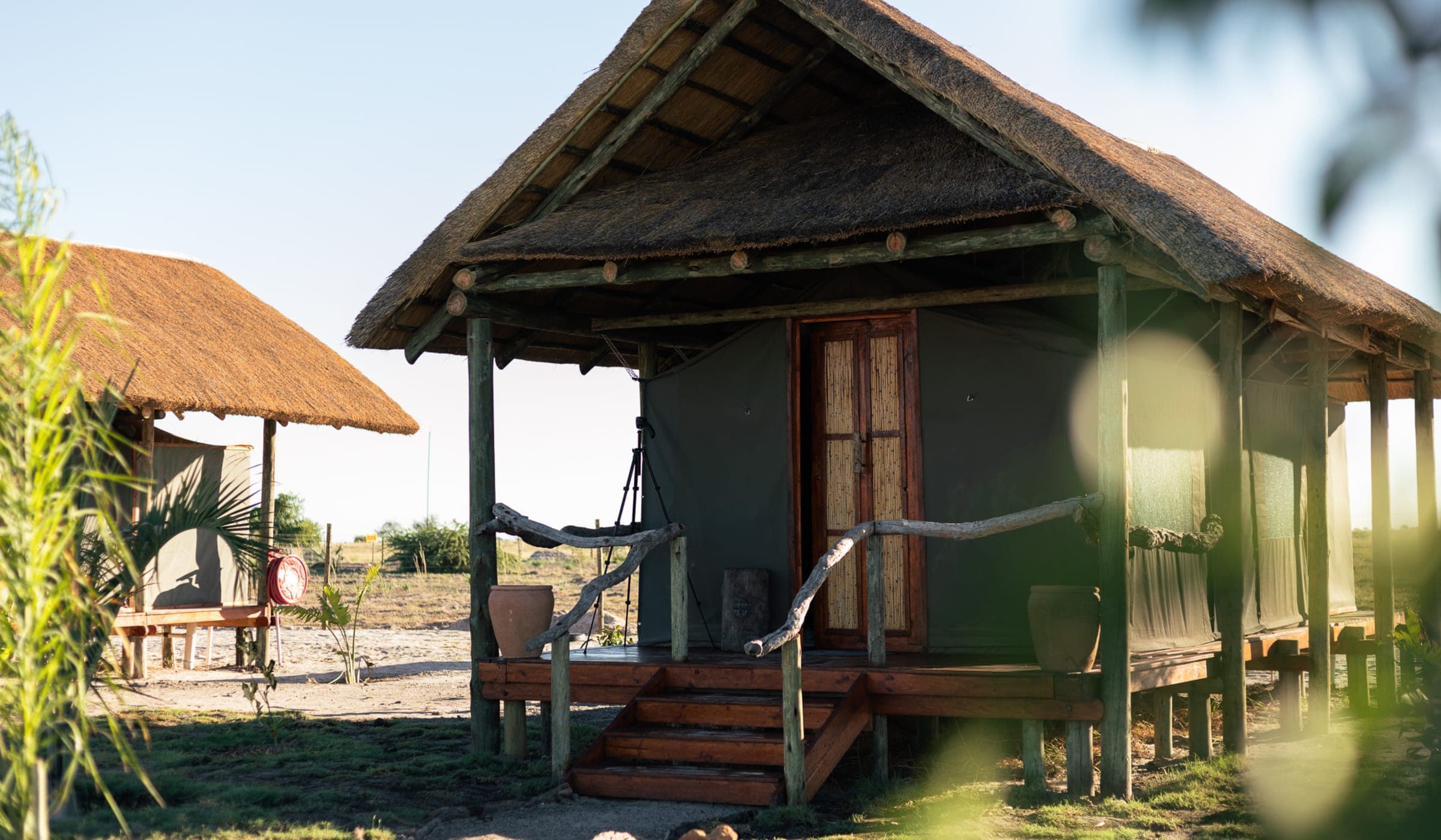 A tented room on wooden decking at Munga Plains