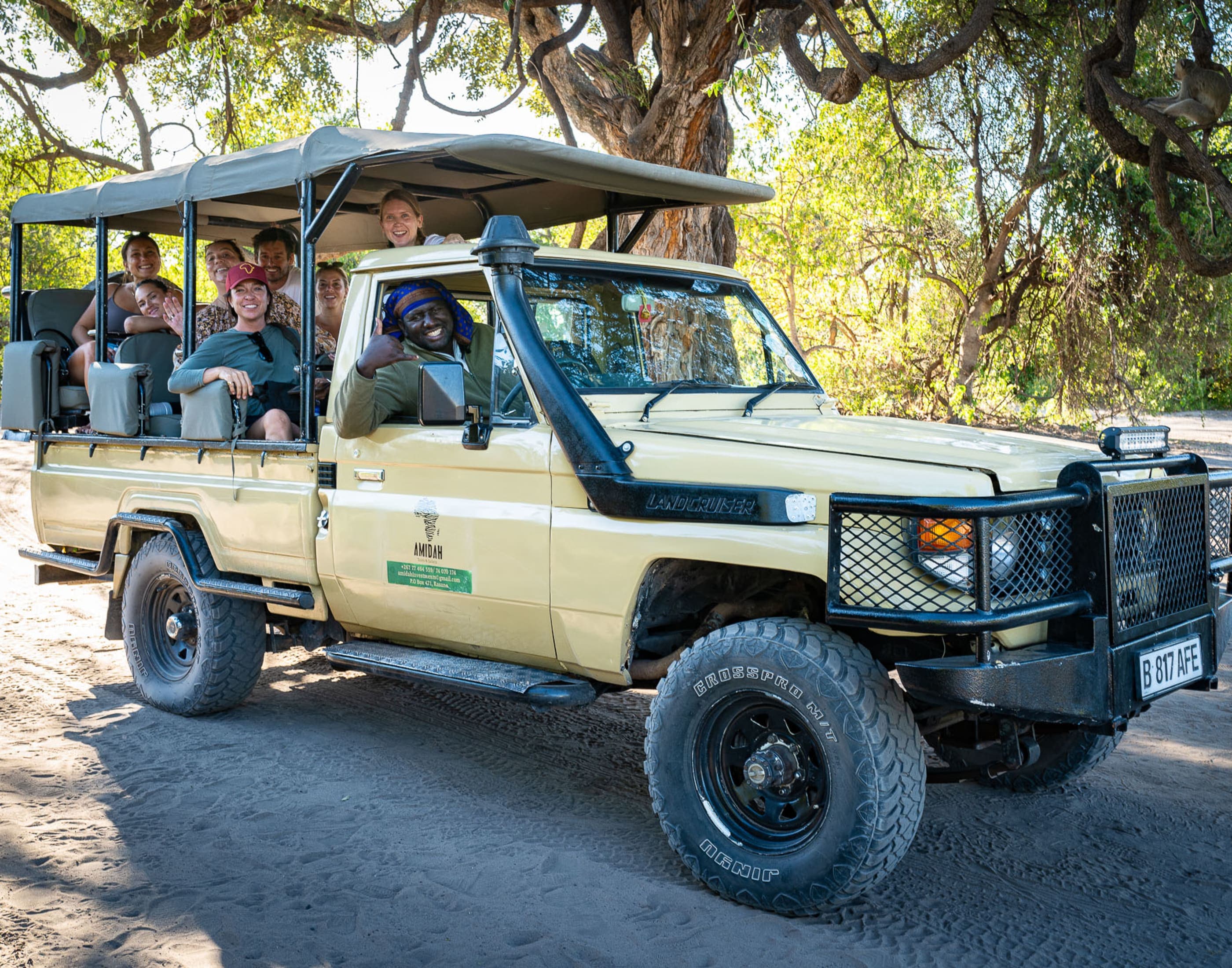 A safari vehicle on a bush track